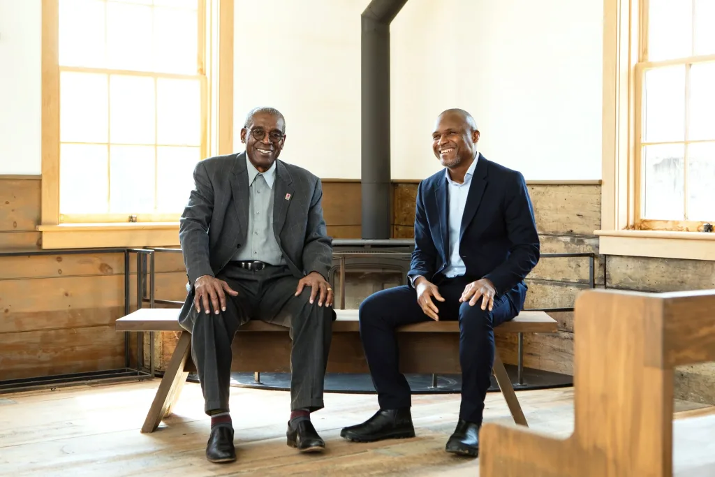 Carl Cadogan (left) and Belonwu Ezenwa (right) inside the African Methodist Episcopal Church